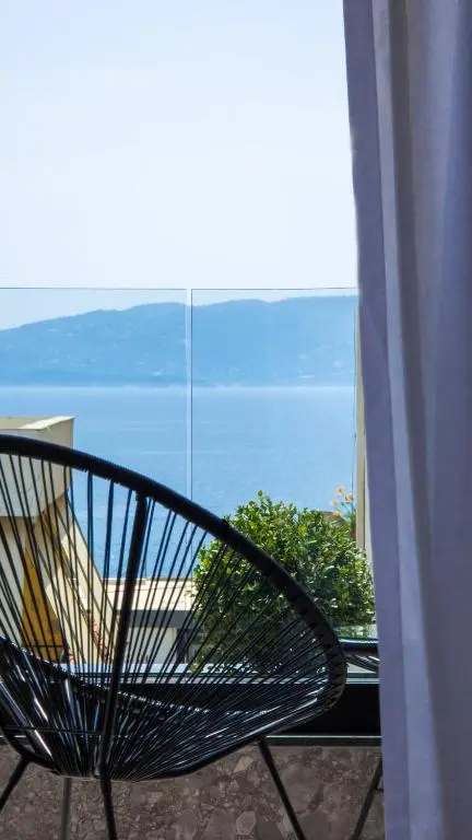 Deluxe Double Room with Side Sea View (302)